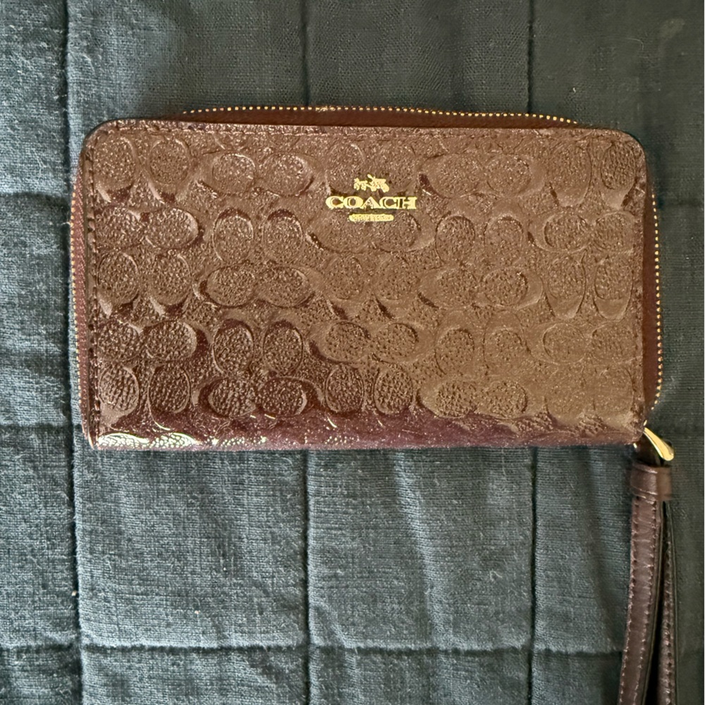 Coach Embossed Floral Brown Wristlet